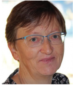 Woman wearing glasses facing camera